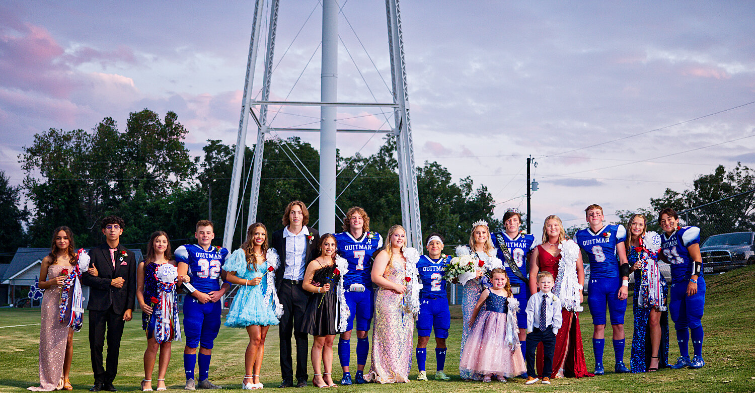 The 2023 Quitman homecoming court gathers shortly after the crowning of king Mikey Pickering and queen Hannah Holland, just before game-time Friday evening. [see more sights & buy Bulldogs prints]